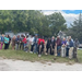 A group of people with shovels.