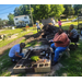 People working in the garden getting it ready to grow.