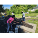 People making the garden beds.