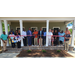 A large group of people at the ribbon cutting ceremony.