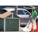 Man with tarp next to a storage box. 