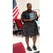 Lady holding up her Fss Graduation Plaque.