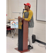 Man wearing a baseball cap standing behind a podium at the 2024 FSS Graduation.