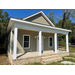 Front door, porch with columns, and windows of third house in revitalization program.