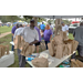 Various people putting together snack bags for the National Night Out.