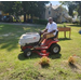 A man riding on a tractor.